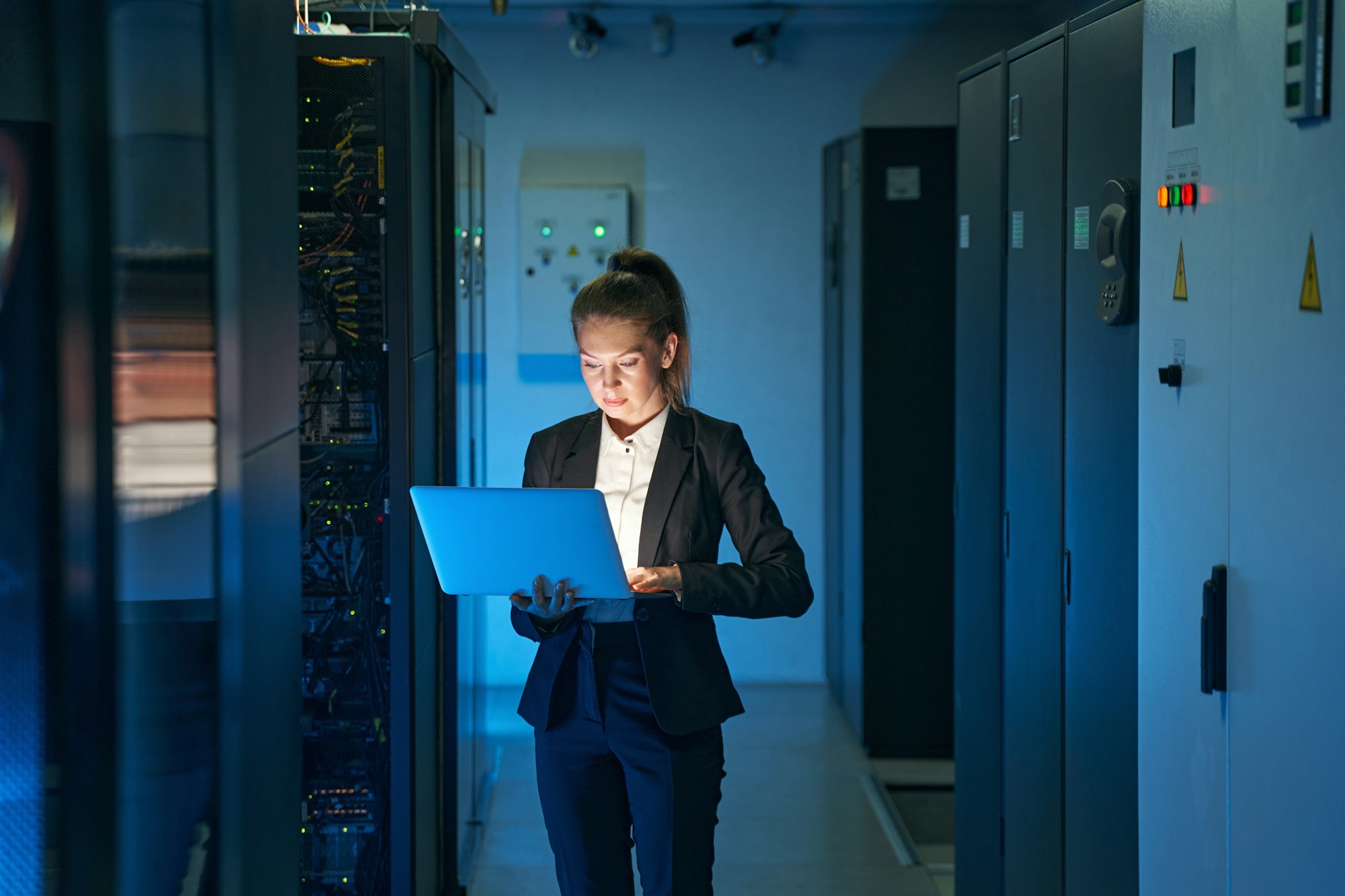 IT engineer specialist working in network server room